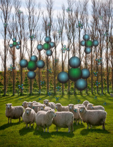 sheep in field with methane molecules