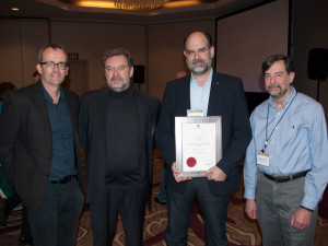 (Left to Right:) Microbial ecologist and director of the University of Queensland Australian Centre for Ecogenomics Phil Hugenholtz, German microbiologist Hans-Peter Klenk, 2011-2014 Van Niels awardee Nikos Kyrpides and 2008-2011 Van Niels awardee George Garrity.