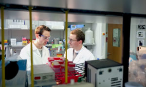 Study first author Thomas Schwander (left) in discussion with Tobias Erb. (Courtesy of Tobias Erb)