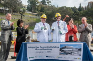 Incoming JGI Director Nigel Mouncey (center, left) and KBase principal Investigator Adam Arkin click soil-filled beakers at the IGB groundbreaking. (Image by Marilyn Chung, Berkeley Lab)