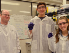 JGI’s Robert Evans (left) with students Tim Kostolansky (center) and Maya Hanck (right).