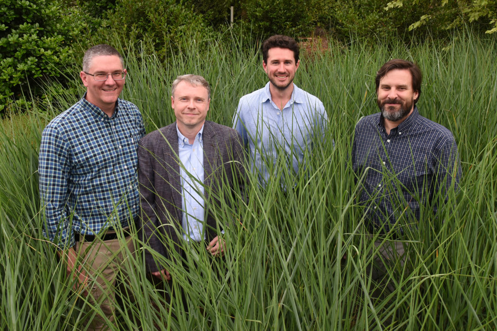 Left to Right: Jerry Jenkins, JGI Plant Program head Jeremy Schmutz, Adam Healey and study senior author Tom Juenger of UT-Austin.