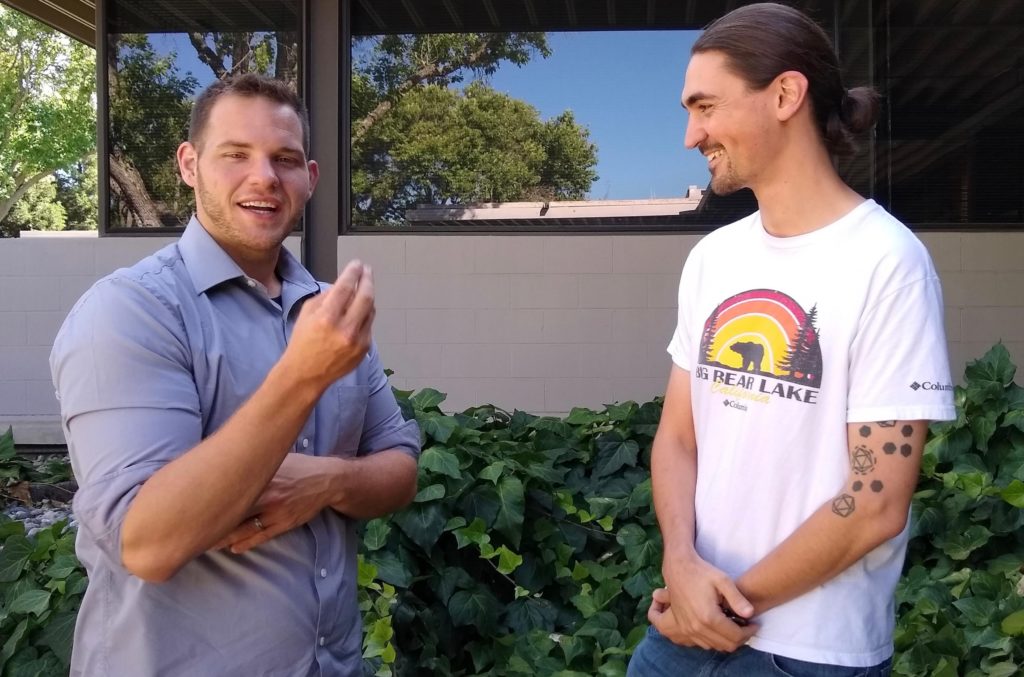 Trubl (left) and Simon Roux (right), research scientist at the JGI, collaborate to uncover viruses in soil. (Photo by Alison F. Takemura)