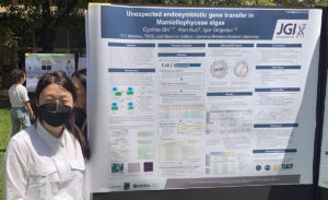 CalTeach intern Cynthia Shi next to her poster